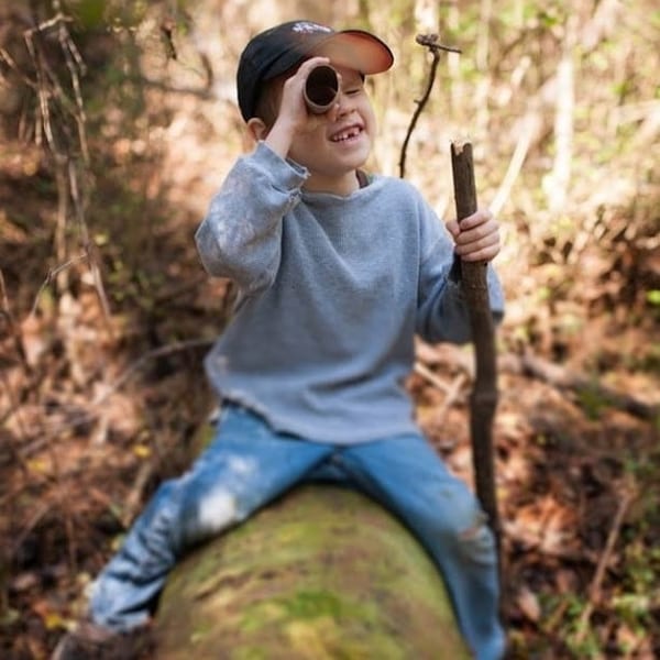 Child exploring nature outdoors